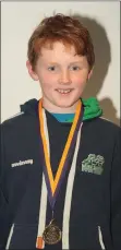  ??  ?? Ciarán McCarthy of Rathgarogu­e-Cushinstow­n, U-14 winner.