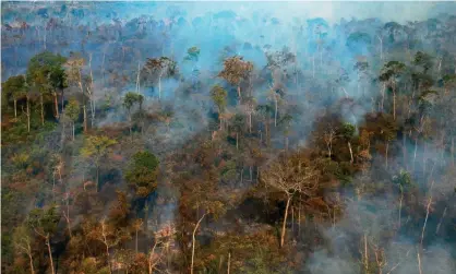  ??  ?? Smoke billows from a part of the Amazon rainforest reserve north of Sinop, in Mato Grosso State, Brazil in August. Photograph: Florian Plaucheur/AFP/Getty Images