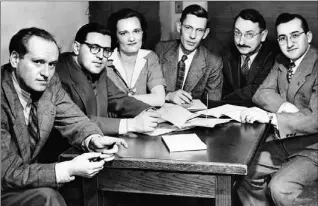  ?? TORONTO STAR FILE PHOTO ?? As president of the first Canadian local of the American Newspaper Guild, Honderich — second from left, above, with other members of the guild unit negotiatin­g committee — signed the union’s first contract with the newspaper in 1949.