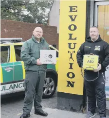  ??  ?? Paramedic Andy Thomas, left, and Michael Donkin, of Evolution Fitness.