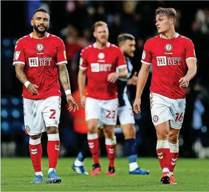  ?? Picture: Rogan Thomson/JMP ?? Bristol City players, from left, Danny Simpson, Tomas Kalas and Cameron Pring look dejected following the 3-0 defeat at West Brom on Saturday