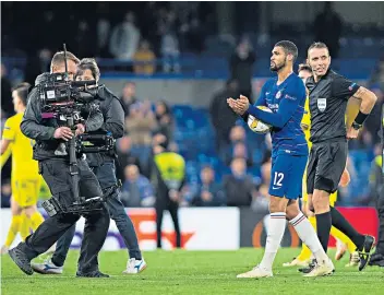  ??  ?? Man of the moment: Chelsea’s Ruben Loftus-cheek departs with the match ball at Stamford Bridge