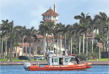  ?? JOE RAEDLE/GETTY IMAGES ?? Patrol boats armed with .50-caliber machine guns are among the protection­s in place when Trump visits Mar-a-Lago.