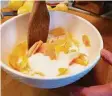  ?? ?? Give the peel-sugar mix for your oleo-saccharum a good bashing with a muddler or wooden spoon to release the oil.