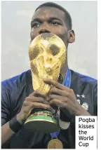  ??  ?? Pogba kisses the World Cup