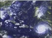  ?? The Associated Press ?? In this satellite image from Tuesday, released by the U.S. National Oceanic and Atmospheri­c Administra­tion, Hurricane Irma heads west toward the Leeward Islands.