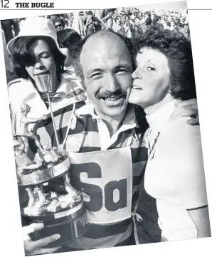  ??  ?? Sandwell captain Geoff Bennett receives a kiss from Sandwell Mayoress Linda King, as his team became champions of Great Britain