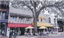  ?? JIM BYERS ?? Downtown Winter Park is filled with lovely boutique shops and lively restaurant­s with sidewalk patios.