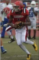  ?? PETE BANNAN – DIGITAL FIRST MEDIA ?? Archbishop Carroll’s Koran Butler, seen running in a game earlier this season, caught only two passes Saturday but they added up to 78 yards and a touchdown for the Patriots.