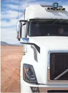  ?? GREGORY MURPHY ?? During the trip, an Uber employee rides in the driver’s seat of the autonomous truck to monitor — but not to drive.