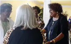  ?? Photo by Neil Abeles ?? ■ Bettie Warren, at right, was both surprised and touched by a successful surprise retirement party for her on June 4.