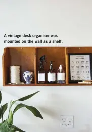  ?? ?? A vintage desk organiser was mounted on the wall as a shelf.