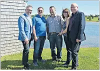  ?? DESIREE ANSTEY/ JOURNAL PIONEER ?? Economic Developmen­t and Tourism minister Heath MacDonald (left), owner of Inn at the Pier Dale Larkin, chair of Resort Municipali­ty of Stanley Bridge, Hope River, Bayview, Cavendish and North Rustico Matthew Jelley, account manager at Eastlink Kim...