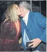 ?? EVAN AGOSTINI/INVISION/AP ?? Jennifer Lopez greets David Foster as they arrive for a party at the Four Seasons Hotel on Saturday.