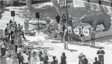  ?? MEL MELCON/LOS ANGELES TIMES ?? UCLA Chancellor Gene Block welcomes students to the campus on the first day of classes Sept. 23.