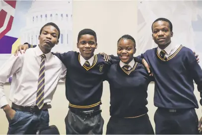  ?? Picture: Jacques Nelles ?? BACK AND RARING TO HELP. From left, Given Ketelo, Bhekumuzi Phala, Precious Tladi and Fortunate Mancoba, who have just completed a three-week youth leadership exchange programme in the US.