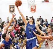  ??  ?? Wes Turner hit the game-winning layup with six seconds left in Brookville’s narrow conquest of TV South. Both teams are 17-3 after the non-conference matchup.