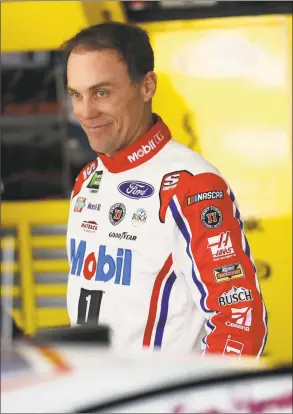  ?? Streeter Lecka / Getty Images ?? Kevin Harvick, driver of the No. 4 Mobil 1/Busch Beer Ford, stands by his car during practice for the Monster Energy NASCAR Cup Series Coca-Cola 600 at Charlotte Motor Speedway.