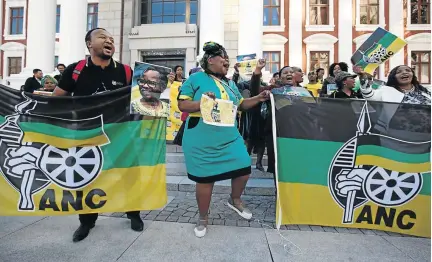  ?? /MARK WESSELS /AFP ?? ANC members celebrate following the defeat of the vote of no confidence against President Jacob Zuma in parliament on Tuesday