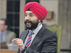  ?? CP PHOTO ?? Navdeep Bains, Minister of Innovation, Science and Economic Developmen­t, answers a question during Question Period in the House of Commons in Ottawa, Tuesday.