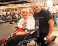  ?? LAUREN HALLIGAN - LHALLIGAN@TROYRECORD.COM ?? Eva Varady, one of the festival’s original organizers, smiles with Rafi Topalian, who was representi­ng Armenia at the 46th annual Festival of Nations, held Sunday at the Empire State Plaza Convention Center in Albany.