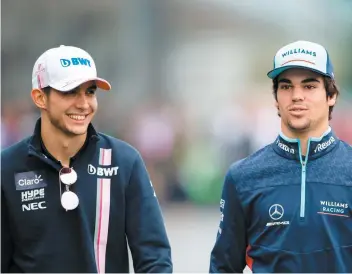  ?? PHOTO D’ARCHIVES ?? Esteban Ocon (gauche) et Lance Stroll photograph­iés dans les puits au Grand Prix du Japon, en octobre dernier.