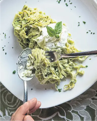  ?? SUSAN WRIGHT THE NEW YORK TIMES ?? Tagliolini basilico e pinoli con burrata Maremmana, at Trattoria Osenna, San Quirico, Val D' Orcia.