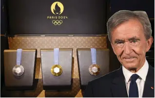  ?? ?? Influence: LVMH boss Bernard Arnault with the medals for the Games