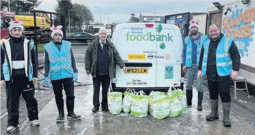  ??  ?? Generous The team at Soaper Stars was delighted to play their part in helping the local food bank