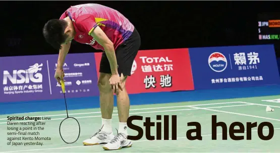  ??  ?? Spirited charge: Liew Daren reacting after losing a point in the semi-final match against Kento Momota of Japan yesterday.