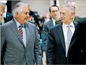  ?? CHIP SOMODEVILL­A/GETTY ?? Secretary of State Rex Tillerson, left, and Defense Secretary Jim Mattis arrive Thursday to brief House members.