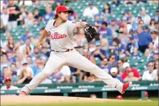  ??  ?? Philadelph­ia Phillies starting pitcher Aaron Nola delivers during the first inning of a baseball game against the Chicago Cubs, on July 6, in Chicago. (AP)