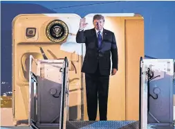  ?? MANAN VATSYAYANA AFP/GETTY IMAGES ?? Donald Trump arrived in Hanoi on Tuesday aboard Air Force One, while Kim Jong Un’s journey to the Vietnamese capital involved a 70-hour train ride through China.