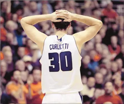  ?? Nam Y. Huh/associated Press files ?? Even basketball players can be frustrated when a teammate misses a shot that any couch jockey is pretty sure he could have made — like Northweste­rn’s Davide Curletti is here. But is weaker shooting what is wrong with college basketball these days?