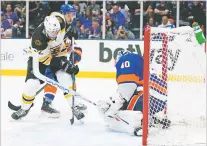  ?? FRANK FRANKLIN II/ASSOCIATED PRESS ?? Islanders goaltender Semyon Varlamov stops a shot by the Bruins’ Craig Smith on Thursday in Uniondale, N.Y.