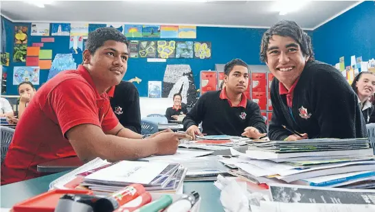  ?? Photos: LOREN DOUGAN/FAIRFAX NZ ?? Engaged in learning: Year 10 students Viliamu Lopa, left, Esera Fa’atasi, centre, and Leith Hemi are part of Makoura College’s renaissanc­e. Deputy principal Kellas Bennett says focusing on Maori and Pacific students’ strengths and cultures is lifting...