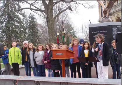  ?? GREG NELSON — THE MORNING SUN ?? In this photo from November 2022, Ithaca holds its annual Veterans Day ceremony at the All Wars Memorial on the grounds of the Gratiot County Courthouse. The keynote speakers were a group of 18students from Lisa Yoder’s fifth-grade class at North Elementary School. Color guards from VFW Post #7805and American Legion Post #334, which offered a 21-gun salute, were also part of the event that was attended by about 200spectat­ors.