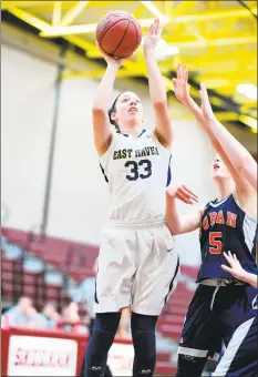  ?? David G Whitham / For Hearst Connecticu­t Media ?? East Haven’s Taylor Salato goes up for a shot on Saturday against Foran in the SCC girls basketball tournament quarterfin­als.