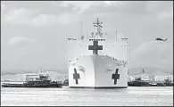  ?? AP/U.S. Navy/Air Force Capt. CHRISTOPHE­R MERIAN ?? The Comfort, a hospital ship of the Military Sealift Command, arrives Tuesday at San Juan, Puerto Rico to provide needed medical services for victims of Hurricane Maria.