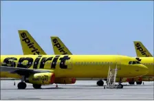  ?? CHRIS O’MEARA — THE ASSOCIATED PRESS ?? A line of Spirit Airlines jets sit on the tarmac at Orlando Internatio­nal Airport on May 20, 2020, in Orlando, Fla. Spirit Airlines shareholde­rs could pick a preferred buyer for their airline Wednesday, when they are scheduled to vote on one of the offers for the budget carrier.