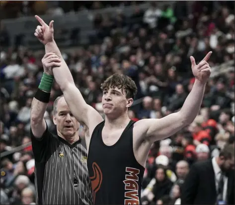  ?? REBECCA SLEZAK — SPECIAL TO THE DENVER POST ?? Mead’s Jake Glade wins the Class 4A 150-pound bracket during the CHSAA state tournament Saturday at Ball Arena. Glade won the match against Thompson Valley’s Kellen Engelhardt.