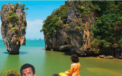  ??  ?? Star quality: ‘James Bond Island’ in Phang Nga Bay. Left: Roger Moore as 007 with Maud Adams and Britt Ekland in The Man With The Golden Gun. Far left: An elephant sanctuary