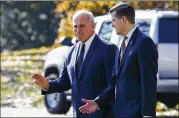  ?? EVAN VUCCI / ASSOCIATED PRESS 2017 ?? White House Chief of Staff John Kelly (left) walks to board Marine One on the South Lawn of the White House in November with White House staff secretary Rob Porter, who has resigned.