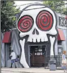  ?? AJC FILE PHOTO ?? The Vortex in Atlanta’s Little Five Points (shown) opened in 1996 as a second location. The first Vortex opened in Midtown in 1992 and moved to its current home at 878 Peachtree St. several years later.