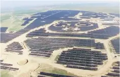  ??  ?? An aerial view shows panda-shaped solar plants built by Panda Green Energy Group in Datong, Shanxi province, China in this still image taken from a video footage, courtesy of Panda Green Energy Group, taken on July 21. — Panda Green Energy...