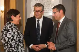  ??  ?? Acting President HE Dolores Cristina with Bupa Branch Manager Charles Zarb and GlobalCapi­tal CEO Reuben Zammit