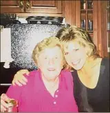  ?? Provided ?? Lynn Strunk, left, with her daughter, Aimee Strunk-Reinoehl at a family party. Strunk loved to entertain friends and family at her home.