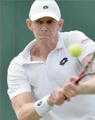  ?? PICTURE: EPA ?? ADVANCING: South Africa’s Kevin Anderson is all concentrat­ion during his third round match against Argentina’s Leonardo Mayer at Wimbledon yesterday. Anderson, the 14th seed, beat Mayer, seeded 24th, 6-4, 7-6(6), 6-3.
