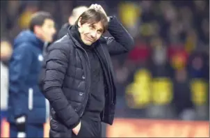  ?? GLYN KIRK/AFP ?? Chelsea coach Antonio Conte looks on during their English Premier League match with Watford on Monday night. Watford won the game 4-1.