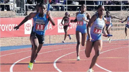  ?? FILE ?? Hydel High School’s Oneka Wilson (left) goes in chase of Edwin Allen’s Tia Clayton during the Championsh­ip of America 4x100m relay at the Penn Relays in Pennsylvan­ia, Philadelph­ia, on Friday, April 29.